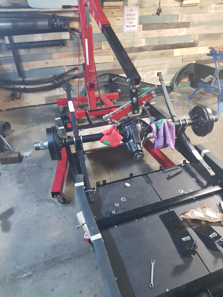 it was far easier to move the chassis and start with the front of the leaf springs