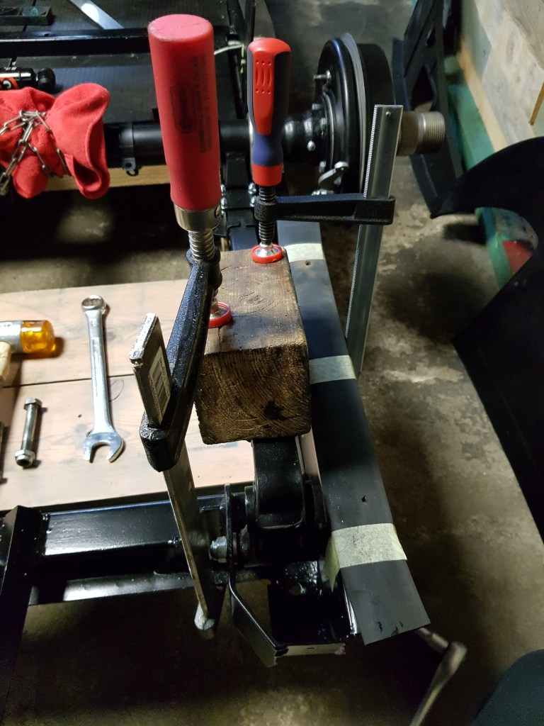 Slowly releasing the pressure of the leaf springs