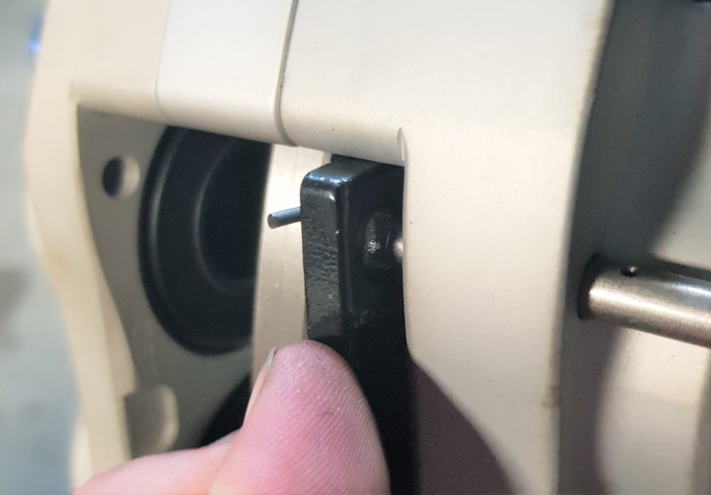 the pin that secures the brake pads cannot slide it - the pads hit the stub axle and there is at least 1mm missing