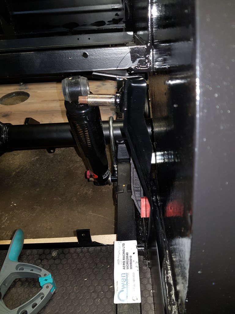 If the bracket is clamped to the chassis side the angle and position of the upper shock mount is off